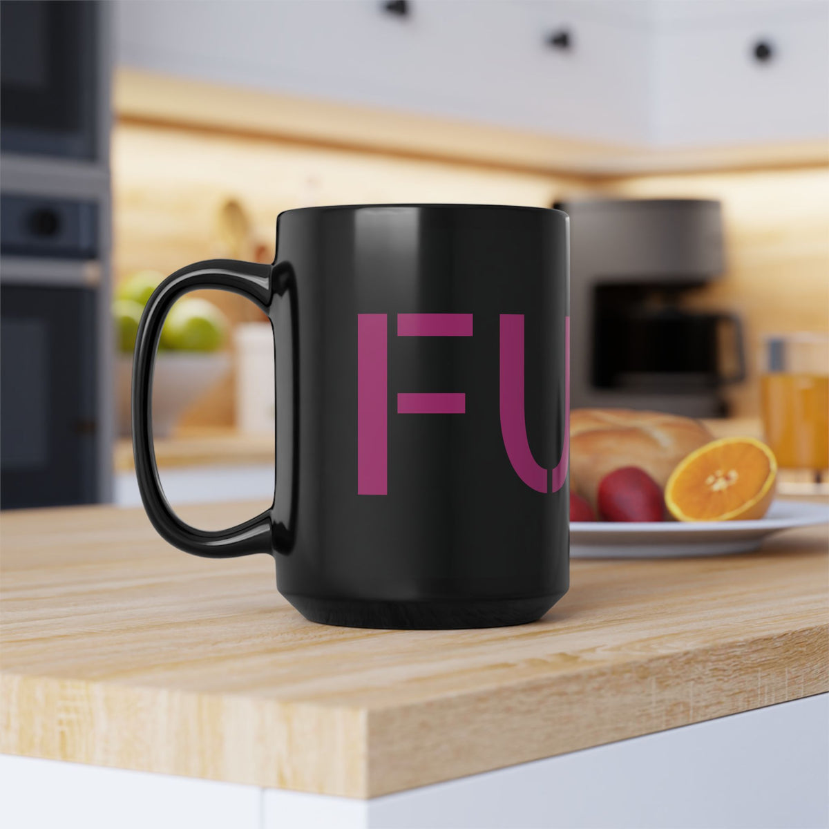 Glossy black 15-ounce mug with oversized motel-pink FUCK typography wrapping around it