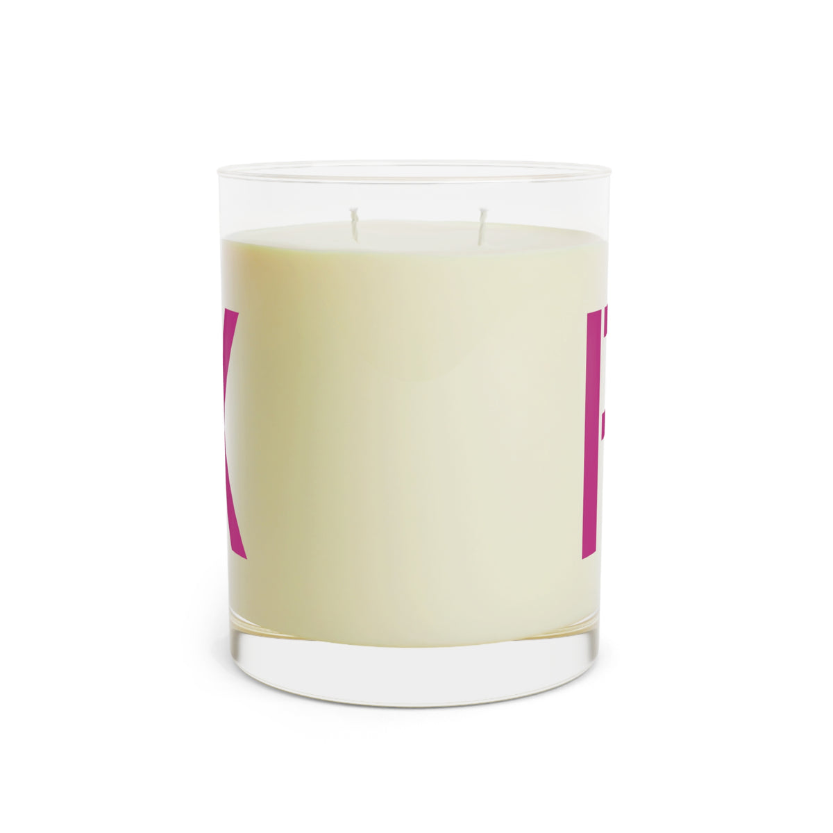 Glass candle with oversized motel-pink FUCK typography on a cream label
