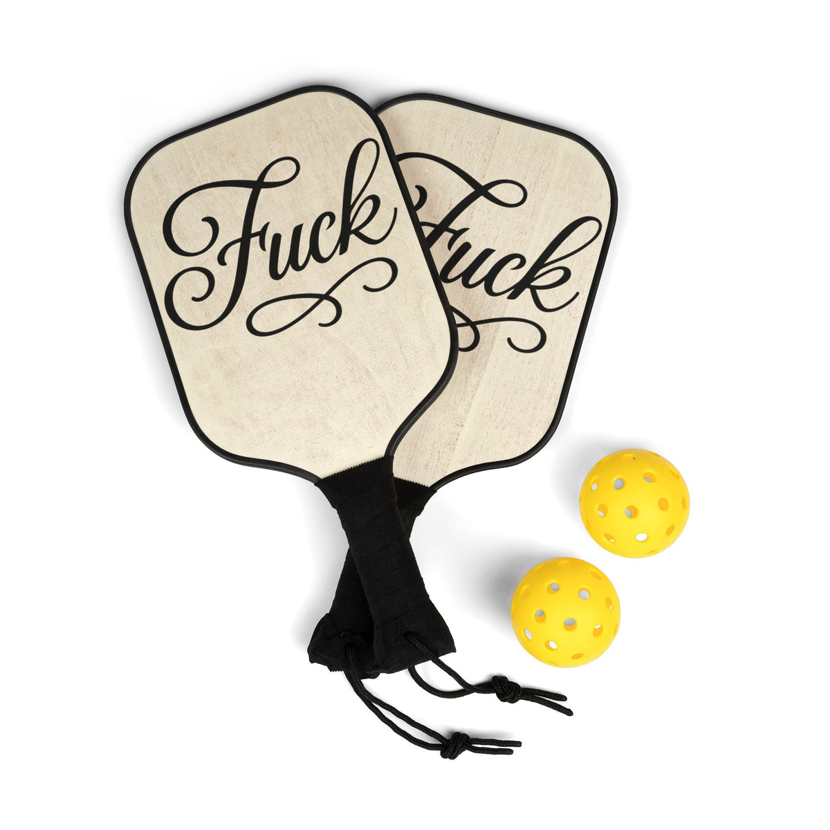 Cream pickleball paddle with black script FUCK lettering and black edge