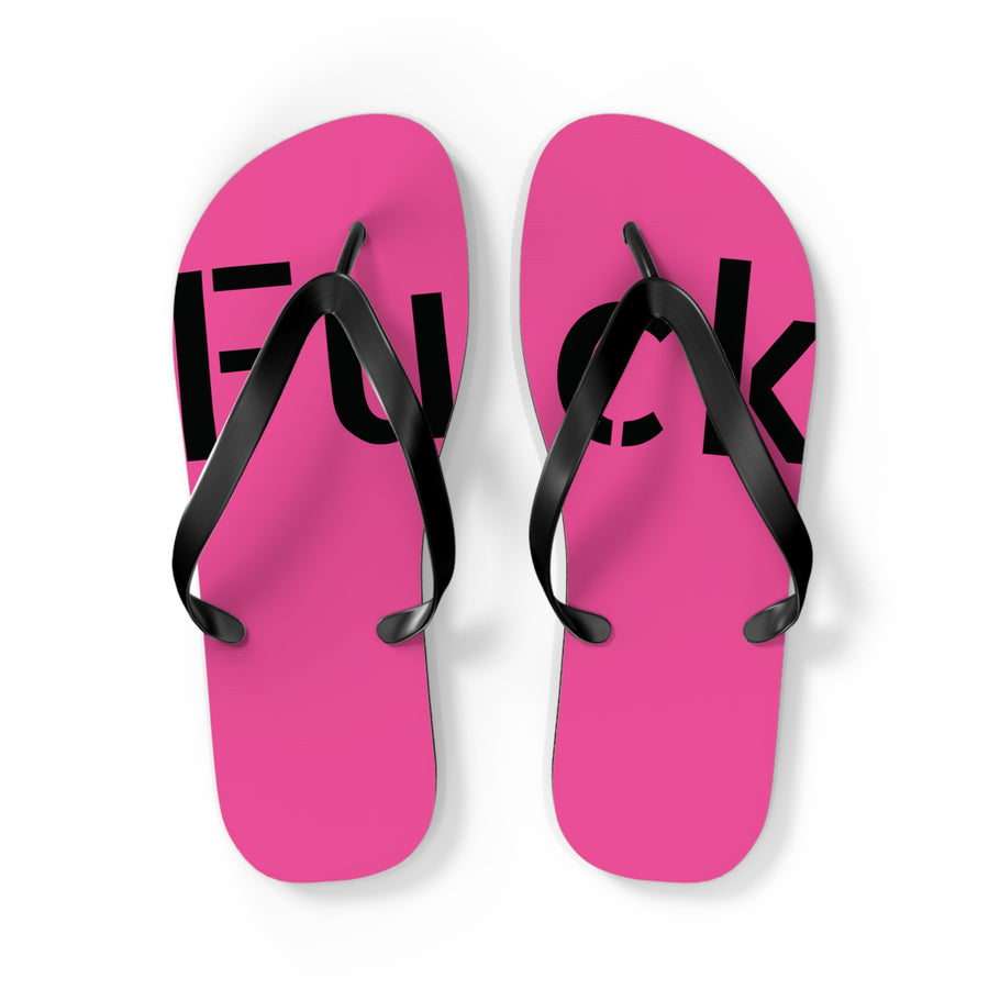 Bright pink flip-flops with black straps and large black FUCK lettering across both feet