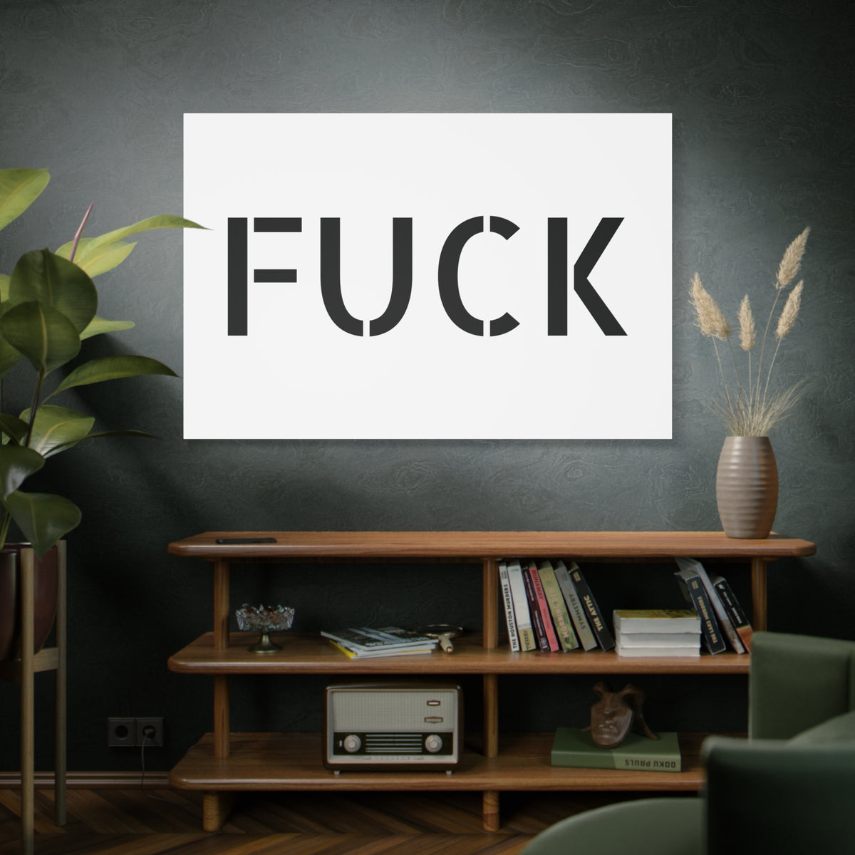 White stretched canvas printed with large minimalist black FUCK typography