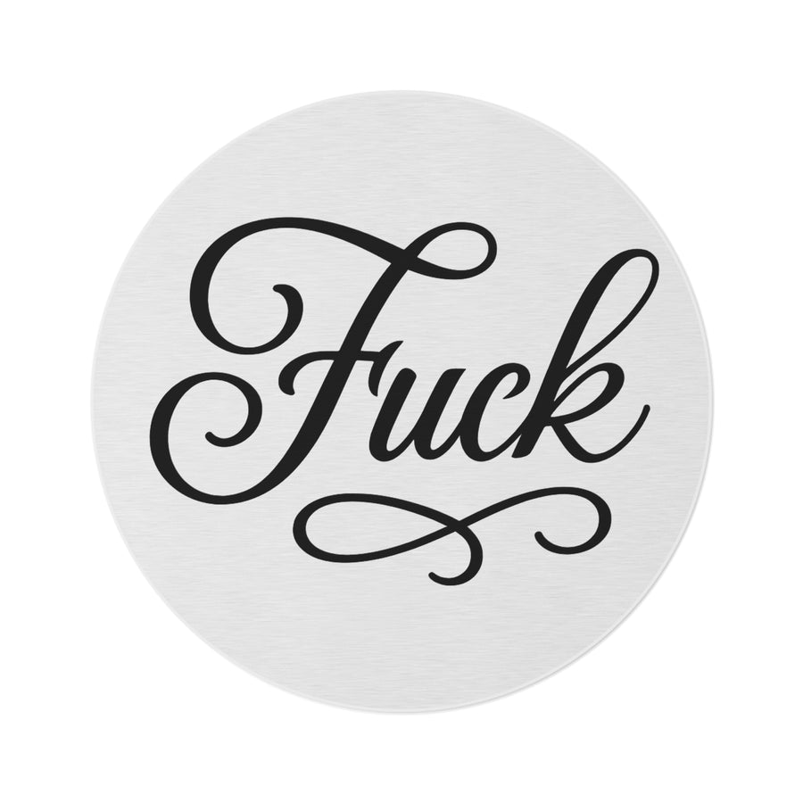 White round chenille rug printed with large black script FUCK lettering
